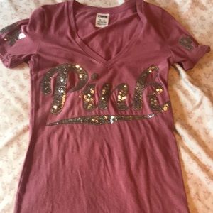 This is a pink tee worn once